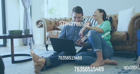 Image of data processing over caucasian couple using laptop