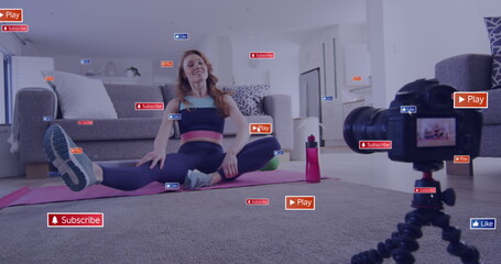 Image of media icons over caucasian woman exercising at home - Powered by Adobe