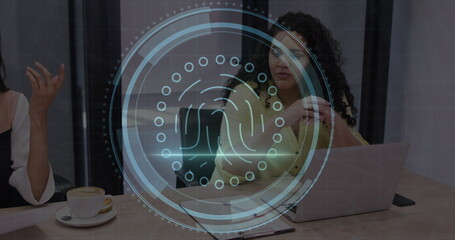 Image of cyber security text, thumbprint icon, diverse woman discussing with coworker in meeting