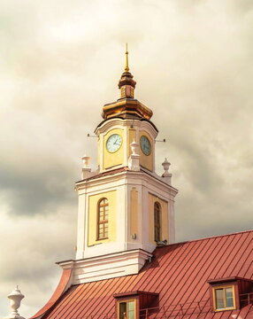 The roof of the old town hall with a tower with chimes