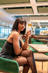 Beauty african woman toasting with white wine