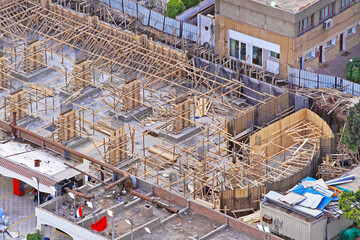 Aerial View of Construction Site With Wooden Scaffolding Cairo Egypt