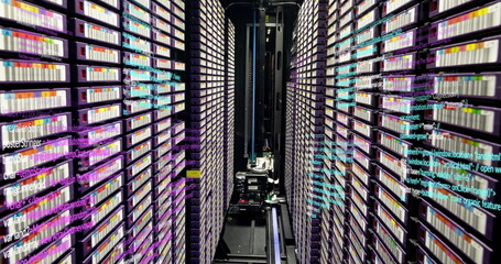 Image of multicolored computer language over large data server room