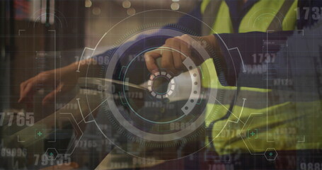 Image of statistic charts over african american male worker in warehouse