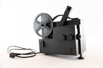 Isolated retro film projector on a white background.
