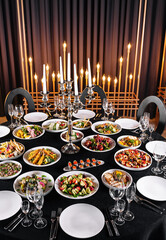 Elegant banquet table setting with candelabra
