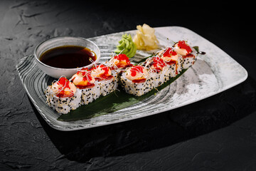 Gourmet california sushi roll with soy sauce
