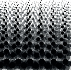 The dots gradually increase in size towards the bottom of the image. In the total mass, objects form a texture.