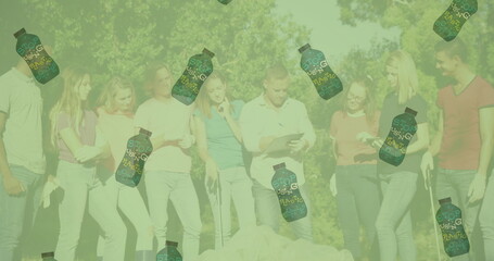 Image of ecology icons over caucasian volunteers segregating waste