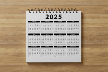 Calendar year 2025 schedule on wood table, wooden background. 2025 calendar planning appointment...