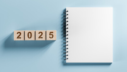 2025 mockup notepad. 2025 cubes wooden table background. New Year. plans for 2025, space for your text on notepad, mockup calendar. top view