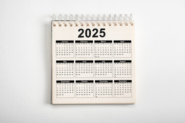 Calendar Year 2025 schedule. 2025 desk calender notepad on light gray background. Resolution,...