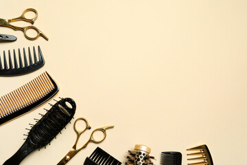 Hairdressing tools on beige background, flat lay. Space for text