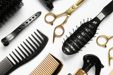 Hairdressing tools on white background, flat lay
