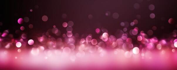 Pink abstract glowing bokeh lights on a black background with space for text or product display