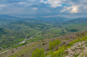 Fototapeta na wymiar scenic view of Bergama Kozak road and valley from arsenal ruins in Pergamon acropolis (Izmir province, Turkiye)