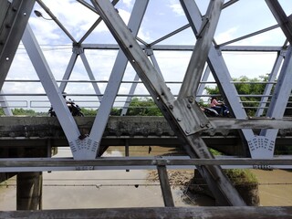 Fototapeta premium The splendor of the Solo bacem bridge which was built over the largest river in Central Java, Indonesia, Bengawan Solo
