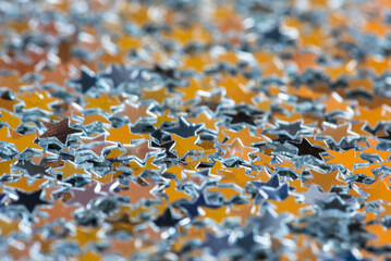 Sparkle abstract glitter confetti with light gold stars
