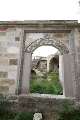 old stone arch of an old stone house