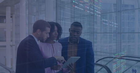 Image of stock market over diverse business people in office