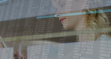 Image of lines and data processing over happy caucasian woman using tablet