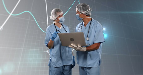 Image of financial data and graphs over caucasian female and male surgeons