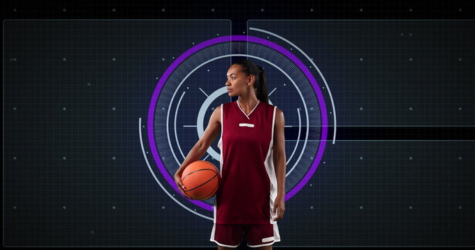 Image of scope scanning and data processing over biracial female basketball player