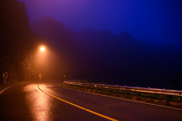 road on the mountain in the mist at night