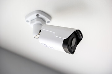 indoor CCTV or Security Camera ceiling overhead on the wall
