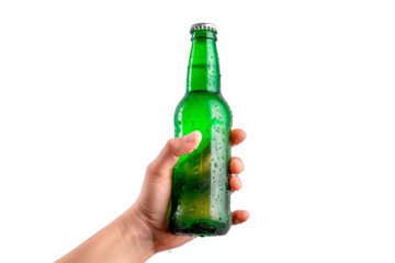 Man's hand holding a green bottle of fresh beer with drops isolated on a cut out PNG transparent background