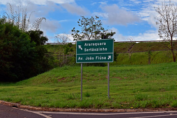 Walking route sign indicating street and nearby cities in Ribeirao Preto, Sao Paulo, Brazil