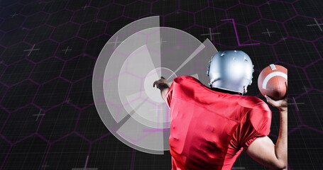 Image of scope scanning and data processing over american football player