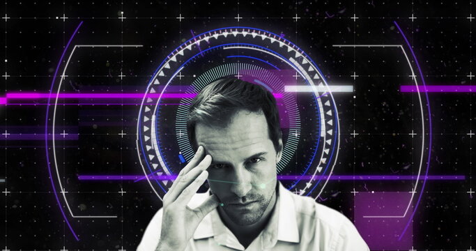 Image of scope scanning and data processing over caucasian man