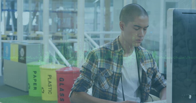 Image of financial data processing over biracial businessman in office