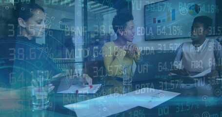 Image of stock market data processing over three diverse female colleagues discussing at office