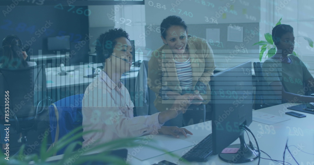 Poster Image of stock market data processing over two diverse women discussing over computer at office