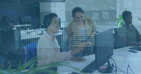 Image of stock market data processing over two diverse women discussing over computer at office