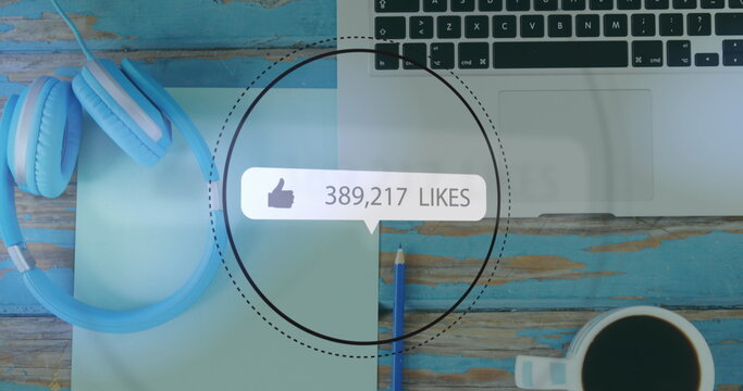 Image of social media data processing over desk with papers and coffee - Powered by Adobe