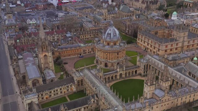 Oxford University aerial tilting up over Radcliffe Square and surrounding streets