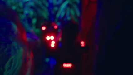 Indoor Adventure: Amidst the birthday excitement, a vibrant group of children embarks on an epic game of laser tag indoors, their strategic maneuvers and playful banter adding to the thrill.