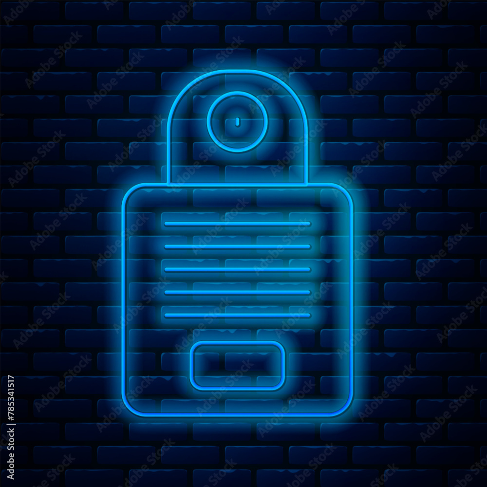 Poster Glowing neon line Intercom icon isolated on brick wall background. Vector