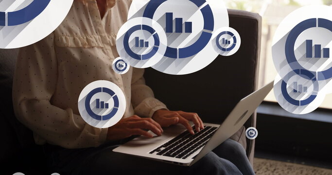 Image of icon in circles, midsection of caucasian woman sitting on sofa and working on laptop