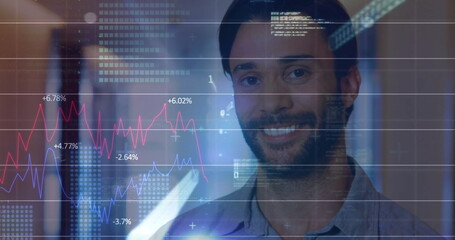 Image of financial data processing over biracial businessman in office