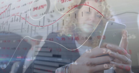 Image of financial data processing over caucasian businesswoman using smartphone