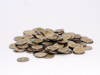 Euro coins poured in a heap