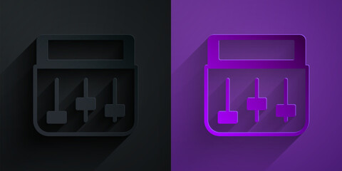 Paper cut Drum machine music producer equipment icon isolated on black on purple background. Paper art style. Vector
