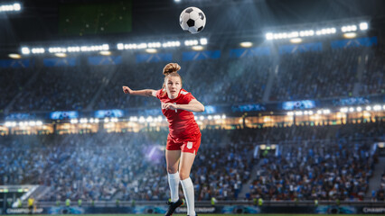 Aesthetic Shot Of Athletic Female Soccer Football Player Doing A Head Kick On Stadium With Excited Crowd Cheering. International Championship Final Match on Arena Full Of Loyal Fans Of The Team.