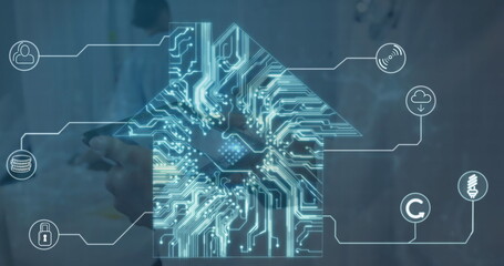 Image of computer circuit board house over caucasian male doctor with tablet