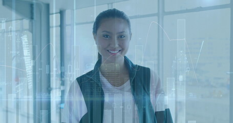 Image of data processing over biracial businesswoman smiling