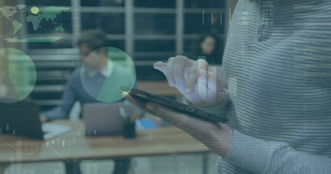 Image of data processing over caucasian businesswoman using tablet in office